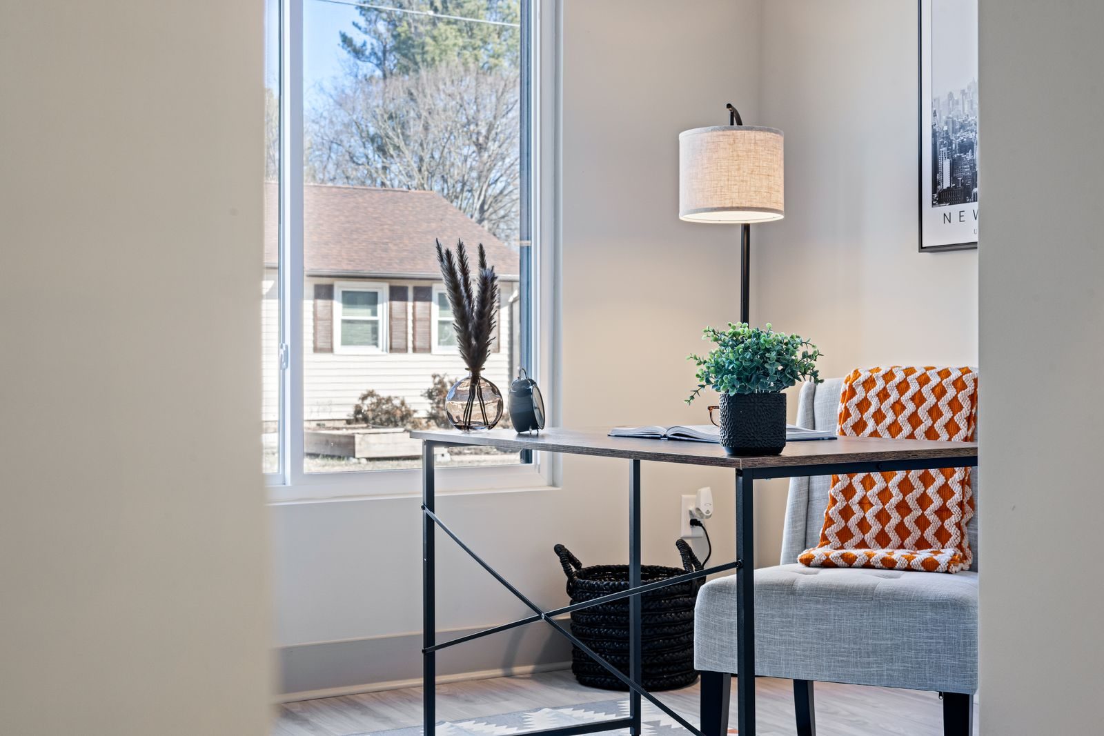Home office with desk by a window in a converted garage